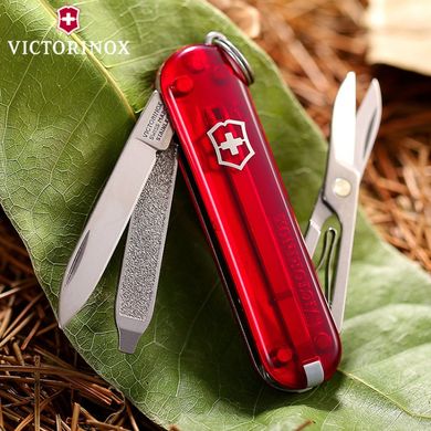 Швейцарський розкладний ніж Victorinox Classic Vx Colors (58мм 7 функцій) червоний прозорий (0.6223.T)